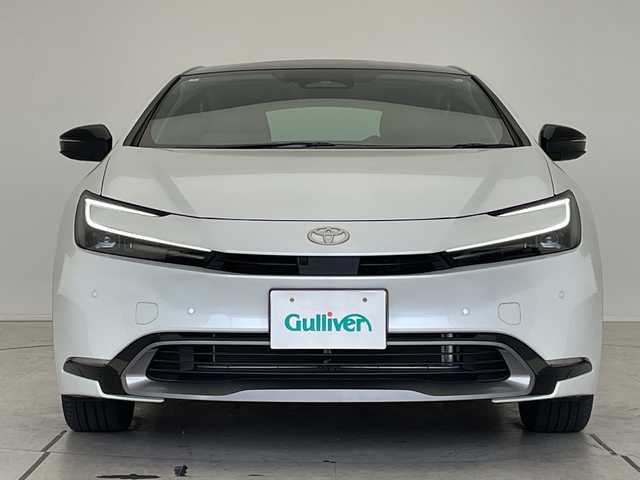 トヨタ プリウス Z 愛知県 2024(令6)年 1.5万km プラチナホワイトパールマイカ 純正12.4型ディズプレイオーディオナビ/全方位カメラ/ガラスルーフ/レーダークルーズコントロール/シートヒーター/エアシート/バッグカメラ/電気リアゲート/パワーシート/コーナーセンサー/純正アルミホイール/ETC2.0/ブラインドスポットモニター/LEDヘッドライト/ステアリングヒーター/インテリジェントミラー/オートマチックハイビーム/衝突軽減システム/フルセグ/ステアリングスイッチ/スマートキー/プッシュスタート