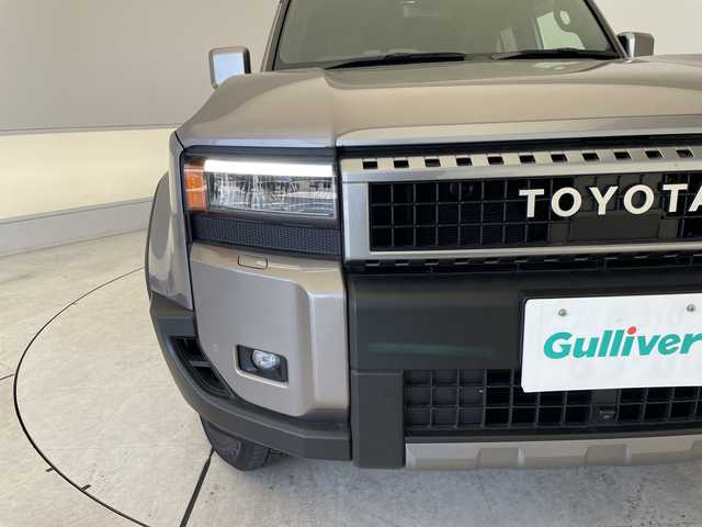 トヨタ ランドクルーザー ２５０ VX 愛知県 2024(令6)年 1万km アバンギャルドブロンズメタリック 純正12.3型ディスプレイオーディオナビ/全方位カメラ/サンルーフ/レーダークルーズコントロール/シートヒーター/エアシート/電動リアゲート/パワーシート/コーナーセンサー/純正アルミホイール/ルーフレール/ETC2.0/ブラインドスポットモニター/４WD/三眼LEDヘッドライト/ステアリングヒーター/インテリジェントミラー/リアオートエアコン/オートマチックハイビーム/衝突軽減システム/フルセグ/ヒッチメンバー/ステアリングスイッチ/スマートキー/プッシュスタート