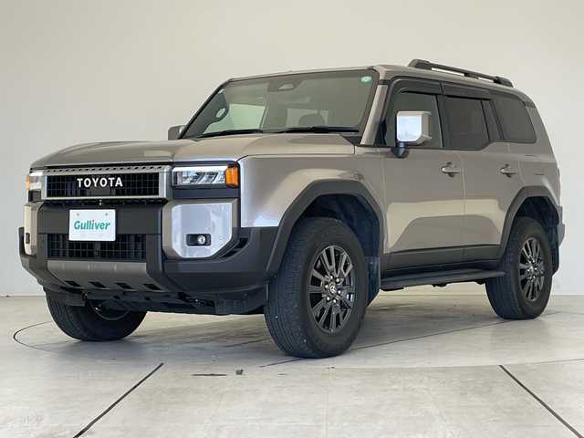 トヨタ ランドクルーザー ２５０ VX 愛知県 2024(令6)年 1万km アバンギャルドブロンズメタリック 純正12.3型ディスプレイオーディオナビ/全方位カメラ/サンルーフ/レーダークルーズコントロール/シートヒーター/エアシート/電動リアゲート/パワーシート/コーナーセンサー/純正アルミホイール/ルーフレール/ETC2.0/ブラインドスポットモニター/４WD/三眼LEDヘッドライト/ステアリングヒーター/インテリジェントミラー/リアオートエアコン/オートマチックハイビーム/衝突軽減システム/フルセグ/ヒッチメンバー/ステアリングスイッチ/スマートキー/プッシュスタート