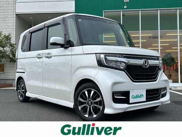 ホンダ Ｎ ＢＯＸ カスタム G L ホンダセンシング 岡山県 2020(令2)年 2.1万km プラチナホワイトパール 純正SDナビゲーション/クルーズコントロール（追従走行有）/ビルトインETC/フルセグTV/純正ドライブレコーダー前後/両側パワースライドドア/シートヒーターD＋N席/バックカメラ/純正アルミホイール/純正フロアマット/ベンチシート/LEDヘッドライト/Bluetooth接続/USB入力端子/横滑り防止機能/衝突被害軽減システム/スマートキー/スペアキー×１