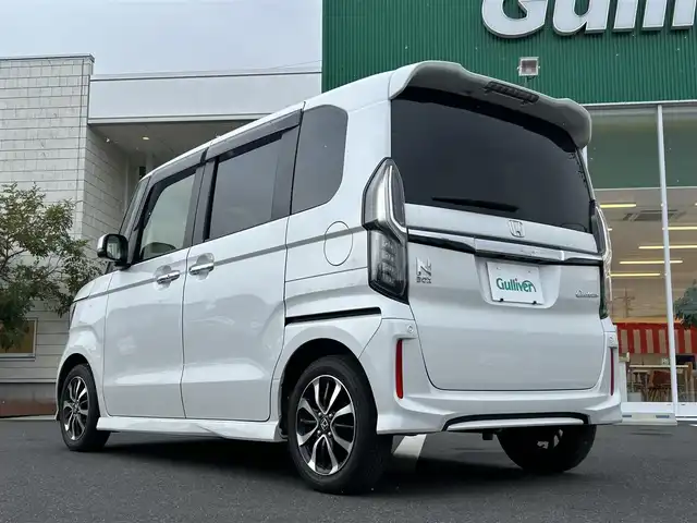 ホンダ Ｎ ＢＯＸ カスタム G L ホンダセンシング 岡山県 2020(令2)年 2.1万km プラチナホワイトパール 純正SDナビゲーション/クルーズコントロール（追従走行有）/ビルトインETC/フルセグTV/純正ドライブレコーダー前後/両側パワースライドドア/シートヒーターD＋N席/バックカメラ/純正アルミホイール/純正フロアマット/ベンチシート/LEDヘッドライト/Bluetooth接続/USB入力端子/横滑り防止機能/衝突被害軽減システム/スマートキー/スペアキー×１