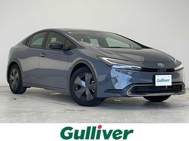 トヨタ プリウス U 愛知県 2024(令6)年 2.3万km グレー 衝突被害軽減ブレーキ/純正７インチディスプレイオーディオ（ナビ無し）/全方位カメラ/レーダークルーズコントロール/フルセグTV/Bluetooth/バックカメラ/ETC2.0/コーナーセンサー/LEDヘッドライト/オートマチックハイビーム/ドライブレコーダー/ブラインドスポットモニター/ステアリングスイッチ/スマートキー/プッシュスタート