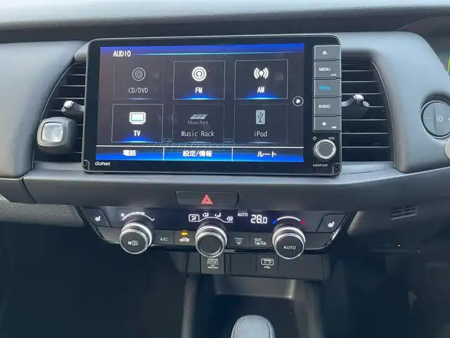 ホンダ フィット e:HEVリュクス 群馬県 2020(令2)年 1.3万km ミッドナイトブルービームM ホンダセンシング/ワンオーナー/ホンダセンシング/・衝突軽減ブレーキCMBS/・誤発進抑制機能/・歩行者事故低減ステアリング/・路外逸脱抑制機能/・アダプティブクルーズコントロール/・LKAS/・先行車発進お知らせ機能/・標識認識機能/ハーフレザーシート/シートヒーター/ハンドルヒーター/純正ナビ（フルセグ/バックカメラ/ Bluetoth/DVD再生）/ETC/前後ドライブレコーダー（SDなし）/プッシュスタート/スマートキー/スタッドレスタイヤ積み込み/取扱説明書/保証書/スペアキー1本