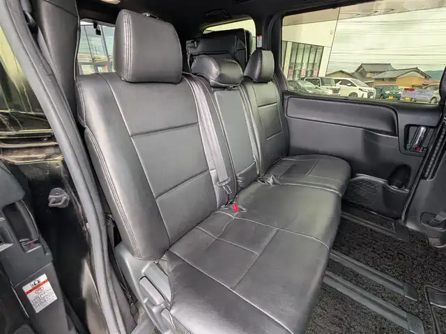 トヨタ ヴォクシー ZS 煌Ⅲ 福井県 2021(令3)年 4.3万km イナズマスパーキングブラックガラスフレーク 純正16インチAW/衝突被害軽減システム/両側パワースライドドア/LEDヘッドライト/前後ドライブレコーダー/クルーズコントロール/前後コーナーセンサー/トヨタセーフティセンス/ハーフレザーシート/バックカメラ/純正SDナビ/ワンセグテレビ/レーンキープアシスト/横滑り防止装置/盗難防止装置/オートマチックハイビーム/アイドリングストップ/純正フロアマット/スマートキー