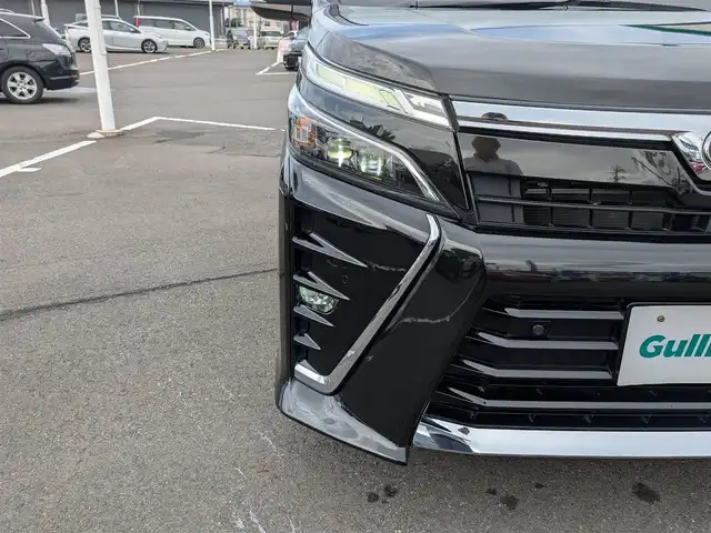 トヨタ ヴォクシー ZS 煌Ⅲ 福井県 2021(令3)年 4.3万km イナズマスパーキングブラックガラスフレーク 純正16インチAW/衝突被害軽減システム/両側パワースライドドア/LEDヘッドライト/前後ドライブレコーダー/クルーズコントロール/前後コーナーセンサー/トヨタセーフティセンス/ハーフレザーシート/バックカメラ/純正SDナビ/ワンセグテレビ/レーンキープアシスト/横滑り防止装置/盗難防止装置/オートマチックハイビーム/アイドリングストップ/純正フロアマット/スマートキー