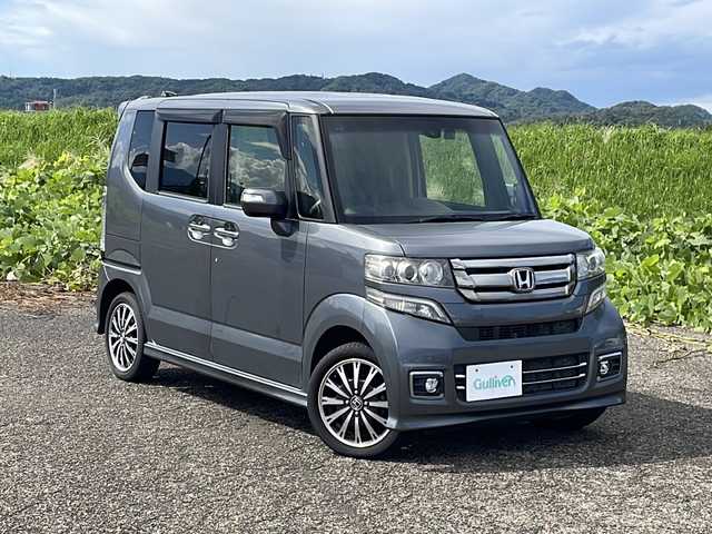ホンダ Ｎ ＢＯＸ カスタム G ターボ Lパッケージ 新潟県 2015(平27)年 6.4万km ポリッシュドメタルメタリック 4WD/社外SDナビ(CN-RE06D)/CD/DVD/BT/フルセグテレビ/SDミュージックサーバー/バックカメラ/ETC/ドライブレコーダー/衝突被害軽減ブレーキ/クルーズコントロール/両側パワースライドドア/半革シート/ベンチシート/シートヒーター /ミラーヒーター/ステアリングスイッチ/パドルシフト/スマートキー/プッシュスタート/キセノンヘッドライト/オートライト/フォグランプ/純正15インチアルミホイール/社外14インチAW冬タイヤ車載