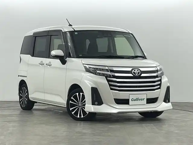 トヨタ ルーミー カスタムG－T 福島県 2021(令3)年 3.5万km パールホワイトⅢ トヨタセーフティセンス/・スマートアシスト/・オートマチックハイビーム/・衝突警報/・衝突回避支援ブレーキ/・ブレーキ制御/・前後誤発進抑制機能/・車線逸脱防止機能/・ふらつき警報/・先行車発進お知らせ機能/・衝突被害軽減システム/・盗難防止装置/・コーナーセンサー/9インチディスプレイオーディオ/・フルセグ/TV/USB/iPod/Android Auto/Apple CarPlay/FM/AM/パノラミックビューモニター/両側パワースライドドア/レーダークルーズコントロール/LEDオートライト/・フォグランプ/シートヒーター/純正アルミホイール付きサマータイヤ/PWRモード/アイドリングストップ/電子パーキング/・オートブレーキホールド/電動格納ミラー/・ウィンカーミラー/前後ドラレコ/ETC/ドアバイザー/ターボ/プッシュスタート/・スマートキー/・スペアキー