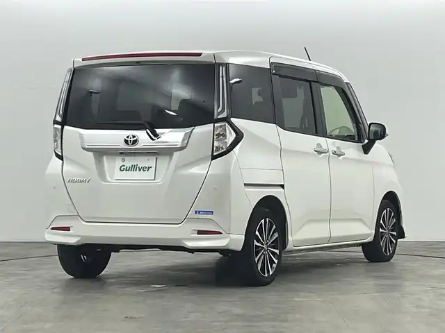 トヨタ ルーミー カスタムG－T 福島県 2021(令3)年 3.5万km パールホワイトⅢ トヨタセーフティセンス/・スマートアシスト/・オートマチックハイビーム/・衝突警報/・衝突回避支援ブレーキ/・ブレーキ制御/・前後誤発進抑制機能/・車線逸脱防止機能/・ふらつき警報/・先行車発進お知らせ機能/・衝突被害軽減システム/・盗難防止装置/・コーナーセンサー/9インチディスプレイオーディオ/・フルセグ/TV/USB/iPod/Android Auto/Apple CarPlay/FM/AM/パノラミックビューモニター/両側パワースライドドア/レーダークルーズコントロール/LEDオートライト/・フォグランプ/シートヒーター/純正アルミホイール付きサマータイヤ/PWRモード/アイドリングストップ/電子パーキング/・オートブレーキホールド/電動格納ミラー/・ウィンカーミラー/前後ドラレコ/ETC/ドアバイザー/ターボ/プッシュスタート/・スマートキー/・スペアキー