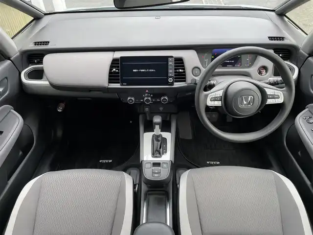 ホンダ フィット e:HEVクロスター 東京都 2021(令3)年 2.6万km サーフブルー/ブラック 純正９型ＳＤナビ＆フルセグ/・CD/SD/DVD/AM/FM/・BluetoothAudio/・AppleCarPlay/ホンダセンシング　/・パーキングセンサーシステム　/・衝突軽減ブレーキ/・車線維持支援システム/・アダプティブクルーズコントロール　/・標識認識機能/・オートハイビーム/・歩行者事故低減ステアリング/・路外逸脱抑制l機能/・先行車発進お知らせ機能/ＯＰルーフレール　/ディアイサー/ＬＥＤヘッドライト　/オートハイビーム　/グレー撥水ファブリック シート/保証書＆取説/ビルトインETC