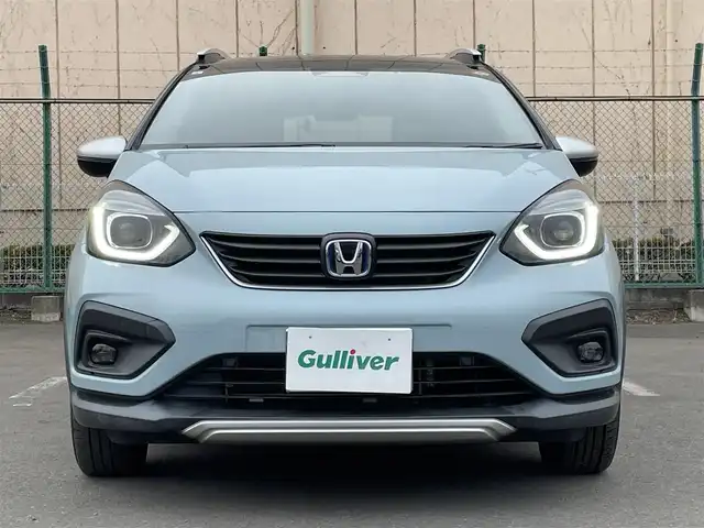 ホンダ フィット e:HEVクロスター 東京都 2021(令3)年 2.6万km サーフブルー/ブラック 純正９型ＳＤナビ＆フルセグ/・CD/SD/DVD/AM/FM/・BluetoothAudio/・AppleCarPlay/ホンダセンシング　/・パーキングセンサーシステム　/・衝突軽減ブレーキ/・車線維持支援システム/・アダプティブクルーズコントロール　/・標識認識機能/・オートハイビーム/・歩行者事故低減ステアリング/・路外逸脱抑制l機能/・先行車発進お知らせ機能/ＯＰルーフレール　/ディアイサー/ＬＥＤヘッドライト　/オートハイビーム　/グレー撥水ファブリック シート/保証書＆取説/ビルトインETC