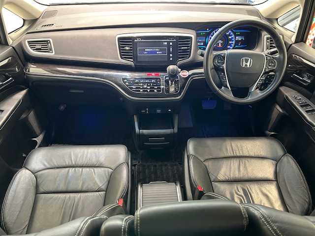 ホンダ オデッセイ ハイブリッド アブソルート・EXホンダセンジング 宮城県 2019(平31)年 5.3万km プラチナホワイトパール ホンダセンシング/・衝突軽減ブレーキ/・アダプティブ・クルーズ・コントロール/・先行者発進お知らせ機能/・標識認識機能/・路外逸脱抑制機能/ブラインドスポットモニター/純正ナビ/・フルセグTV/Bluetooth/CD/DVD/HDMI/USB/・全方位カメラ/・前後ドライブレコーダー/・ETC2.0/純正フリップダウンモニター/両側パワースライドドア/コーナーセンサー/電子パーキング/オートブレーキホールド/アイドリングストップ/革巻きステアリング/・ステアリングスイッチ/レザーシート/・シートヒーター（運転席/助手席）/・パワーシート（運転席/助手席）/・オットマン/プッシュスタート/スマートキー/LEDヘッドライト/・フォグランプ/・オートライト/電動格納ミラー/純正アルミホイール/純正フロアマット/ドアバイザー