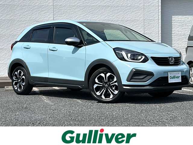 ホンダ フィット e:HEVクロスター 千葉県 2021(令3)年 0.8万km サーフブルー 純正ナビ　バックカメラ　フルセグＴＶ　ＥＴＣ２．０　追従走行クルーズコントロール　前後ドライブレコーダー　前後コーナーセンサー　レーンキープアシスト　カーテンエアバッグ　ＬＥＤ　純正１６ＡＷ　
