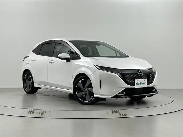 日産 オーラ G レザーエディション 埼玉県 2023(令5)年 2.4万km ブリリアントホワイトパール エマージェンシーブレーキ/純正ナビゲーション/（フルセグTV/Bluetooth/AM/FM/USB）/アラウンドビューモニター/クリアランスソナー /プロパイロット/BOSEサウンド/ドライブレコーダーDH5-S/ビルトインETC2.0/ワイヤレス充電/レザーシート/シートヒーター /ハンドルヒーター/オートLEDヘッドライト/純正１７インチアルミホイール