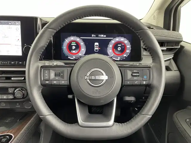 日産 オーラ G レザーエディション 埼玉県 2023(令5)年 2.4万km ブリリアントホワイトパール エマージェンシーブレーキ/純正ナビゲーション/（フルセグTV/Bluetooth/AM/FM/USB）/アラウンドビューモニター/クリアランスソナー /プロパイロット/BOSEサウンド/ドライブレコーダーDH5-S/ビルトインETC2.0/ワイヤレス充電/レザーシート/シートヒーター /ハンドルヒーター/オートLEDヘッドライト/純正１７インチアルミホイール
