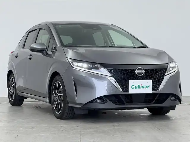 日産 ノート X 愛知県 2021(令3)年 4.4万km ダークメタルグレー 純正9インチSDナビ/（BT/AppleCarPlay/フルセグTV）/アラウンドビューモニター/プロパイロット/置くだけ充電/デジタルインナーミラー/合皮シート/衝突軽減システム/ブラインドスポットモニター/標識検知支援/レーンキープアシスト/コーナーセンサー/オートマチックハイビーム/スポーツモード/エコモード/EVモード/オートブレーキホールド/純正16インチAW/純正LEDヘッドライト/カーテンエアバッグ