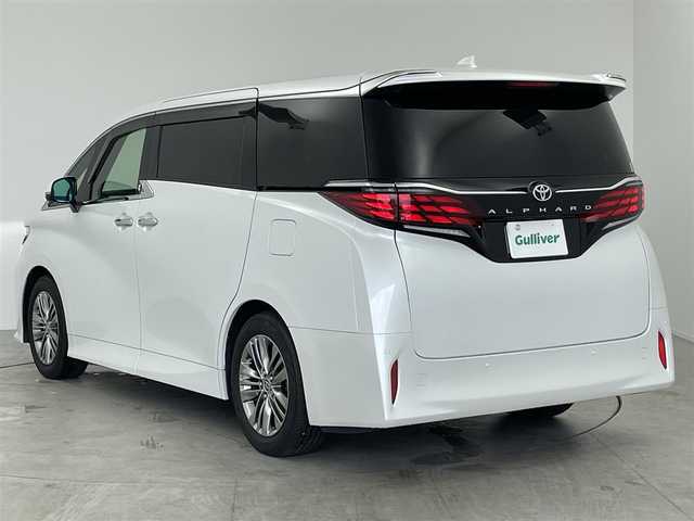 トヨタ アルファード Z 愛知県 2024(令6)年 2万km プラチナホワイトパールマイカ 左右独立ムーンルーフ/12.3インチ純正フリップダウンモニター/メーカー14インチディスプレイオーディオ/（BT/AM/FM/フルセグTV）/全方位バックカメラ/3眼LEDヘッドライト/合皮シート/前席パワーシート/前席＋二列目シートベンチレーション/前席＋二列目シートヒーター/ステアリングヒーター/後席用パワーサイドシェード/電動リアゲート/置くだけ充電/トヨタセーフティセンス/・プリクラッシュセーフティ/・レーントレーシングアシスト/・ブラインドスポッとモニター/・レーダークルーズコントロール/・オートマチックハイビーム/・ロードサインアシスト/・発進遅れ告知機能/・フロントクロストラフィックアラート/・ドライバー異常時対応システム/エコモード/nonoeX/エコモード/純正18インチAW/ドアバイザー/両側パワースライドドア/カーテンエアバッグ
