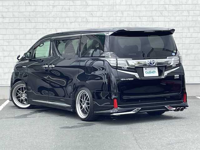 トヨタ ヴェルファイア ハイブリット ZR Gエディション 愛知県 2015(平27)年 7.5万km ブラック ・モデリスタフルエアロ/・HKS車高調/・純正SDメモリーナビ/・フルセグTV/・CD/DVD再生/・ミュージックサーバー（SD録音）/・Bluetooth接続/・ETC/・本革シート/・パワーシート（D/N/2列目）/・キャプテンシート/・両側パワースライドドア/・パワーバックドア/・社外製20インチアルミホイール/・LEDヘッドライト/・オートマチックハイビーム/・電動パーキングブレーキ/・ブレーキホールド/・アダプティブクルーズコントロール/・全席オートエアコン/・ドライブレコーダー（前）/・コーナーセンサー/・横滑り防止装置/・シートヒーター（D/N）/・純正フロアマット/・バックカメラ/・スマートキー/・プッシュスタート