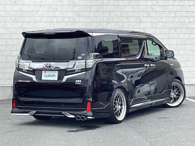 トヨタ ヴェルファイア ハイブリット ZR Gエディション 愛知県 2015(平27)年 7.5万km ブラック ・モデリスタフルエアロ/・HKS車高調/・純正SDメモリーナビ/・フルセグTV/・CD/DVD再生/・ミュージックサーバー（SD録音）/・Bluetooth接続/・ETC/・本革シート/・パワーシート（D/N/2列目）/・キャプテンシート/・両側パワースライドドア/・パワーバックドア/・社外製20インチアルミホイール/・LEDヘッドライト/・オートマチックハイビーム/・電動パーキングブレーキ/・ブレーキホールド/・アダプティブクルーズコントロール/・全席オートエアコン/・ドライブレコーダー（前）/・コーナーセンサー/・横滑り防止装置/・シートヒーター（D/N）/・純正フロアマット/・バックカメラ/・スマートキー/・プッシュスタート