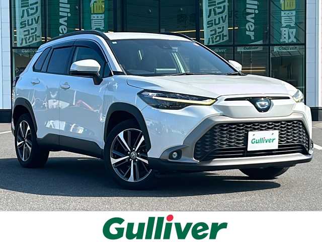 トヨタ カローラ クロス ハイブリッド Z 岡山県 2022(令4)年 7万km プラチナホワイトパールマイカ 純正8インチディスプレイオーディオ/（AM.FM.BT.TV）/バックカメラ/前席シートヒーター/アーフレザーシート/前後ドタイブレコーダー/パワーバックドア/スマートキー/トヨタセーフティセンス/・アダプティブクルーズコントロール/・プリクラッシュセーフティ/・レーンディパーチャアラート/。オートマチックハイビーム