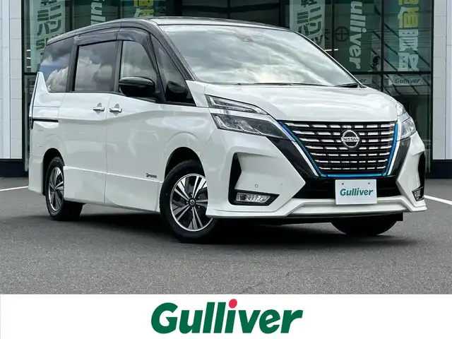 日産 セレナ e－パワー ハイウェイスター V 岡山県 2020(令2)年 6.9万km ブリリアントホワイトパール 2トーン 純正１０インチナビ/（AM.FM.BT.フルセグ.CD.DVD）/全方位モニター/フリップダウンモニター/両側パワースライドドア/セーフティパック/ステアリングヒーター/プロパイロット/エマージェンシーブレーキ/・衝突軽減ブレーキ/・コーナーセンサー/・オートマチックハイビーム/ビルトインETC/ブラインドスポットモニター/LEDヘッドライト