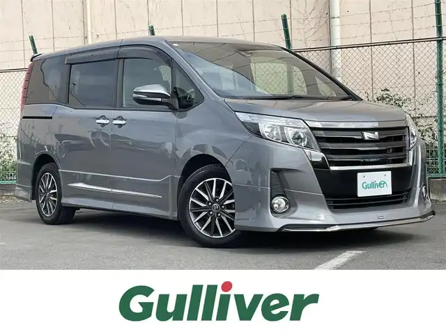 トヨタ ノア Si ダブルバイビー 東京都 2017(平29)年 2.9万km アイスチタニウムマイカメタリック モデリスタエアロ/純正ナビ/フルセグTV/DVD/BT/バックカメラ/トヨタセーフティセンス/ブラックレザーファブリックコンビシート/ETC/両側電動スライドドア/純正フロアマット/サイドバイザー