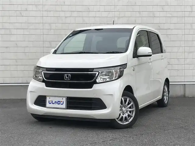 ホンダ Ｎ ＷＧＮ G スタイリッシュパッケージ 栃木県 2015(平27)年 7.6万km プレミアムホワイトパールⅡ 株)IDOMが運営する【じしゃロン小山店】の自社ローン専用車両になります。こちらは現金またはオートローンご利用時の価格です。自社ローンご希望の方は別途その旨お申付け下さい//禁煙車/純正ワンセグナビ/（CD/DVD/AM/FMラジオ）/スマートキー/プッシュスタート/バックカメラ/ＥＴＣ/クルーズコントロール/アイドリングストップ/ステアリングリモコン/電動格納ドアミラー/パワーウインドウ/オートライト