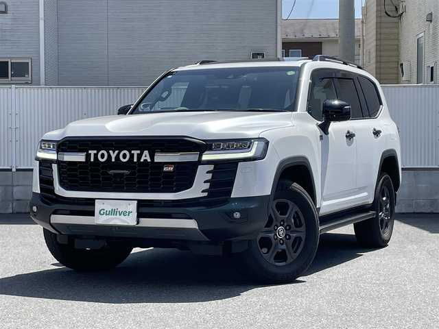 トヨタ ランドクルーザー GRスポーツ 栃木県 2023(令5)年 1.4万km プレシャスホワイトパール トヨタセーフティセンス/サンルーフ/JBLプレミアムサウンドシステム/リヤシートエンターテインメントシステム/純正12.3インチナビ/CD/DVD/BT/フルセグ/MSV/Miracast/パワーバックドア/レーダークルーズコントロール/ルーフレール/クールボックス/ビルトインETC2.0/4WD/Pantheraセキュリティ/電動格納サードシート/ヘッドアップディスプレイ/サイドステップ/LEDオートライト/オートハイビーム/レザーシート/前席・2列目シートヒーター/前席・2列目シートベンチレーション/前席パワーシート（運転席メモリー機能付き）/クリアランスソナー/前後ドライブレコーダー/ブラインドスポットモニター/パーキングサポートブレーキ/オートブレーキホールド/ステアリングヒーター/ステアリングスイッチ/取扱説明書/保証書/スペアキー１