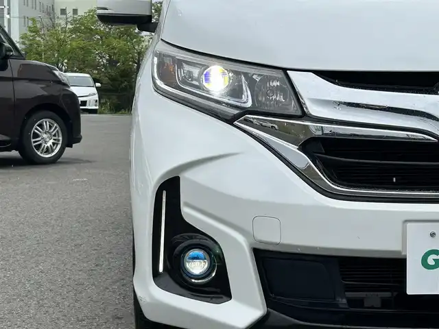 ホンダ フリード ハイブリット G ホンダセンシング 青森県 2017(平29)年 4.2万km ホワイトオーキッドパール ・寒冷地仕様/・4WD/・純正ナビ/・フルセグ/・CD/DVD/SD/USB/Bluetooth/・バックカメラ/・プッシュスタート/・スマートキー/・スペアキー1本/・ホンダセンシング/・横滑り防止/・オートライト/・クルーズコントロール（追従有）/・純正ビルドインETC/・ドライブレコーダー/・両側パワースライドドア/・シートヒーター（N＋D）/・純正フロアマット/・純正AW15インチ/・取扱説明書