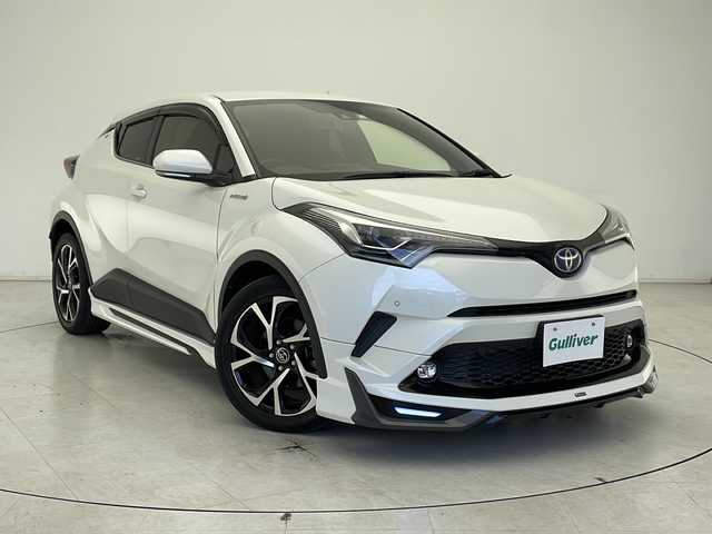 トヨタ Ｃ－ＨＲ G 千葉県 2018(平30)年 2.6万km ホワイトパールクリスタルシャイン モデリスタエアロ/レーダークルーズコントロール/コーナーセンサー前後/レーンキープアシスト/衝突軽減システム/純正SDナビ（NSZT-W66T）/　Bluetooth/フルセグTV/CD/DVD/バックカメラ/純正ビルトインETC/ハーフレザーシート/純正フロアマット/LEDヘッドライト/オートライト/オートハイビーム/純正18インチアルミホイール