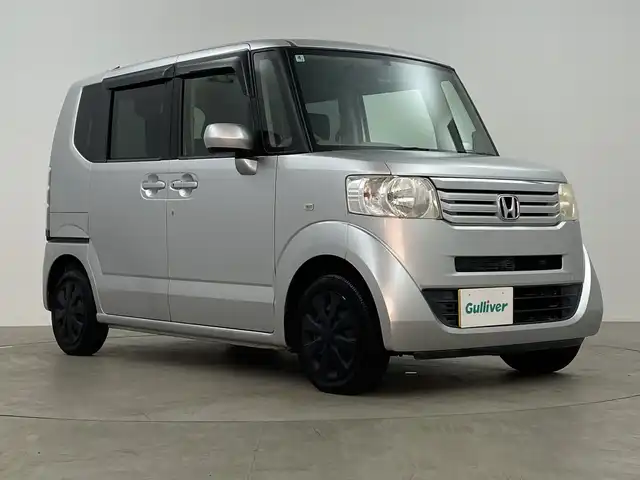ホンダ Ｎ ＢＯＸ ＋ G 鹿児島県 2014(平26)年 6.7万km カトラリーシルバーM 社外ナビ/(BT/CD/DVD/AM/FM/フルセグTV)/前後ドライブレコーダー/アイドリングストップ/ベンチシート/チップアップシート/レザー調シートカバー/運転席シートハイトアジャスター/プラズマクラスター搭載エアコン/スペアキー/オートライト