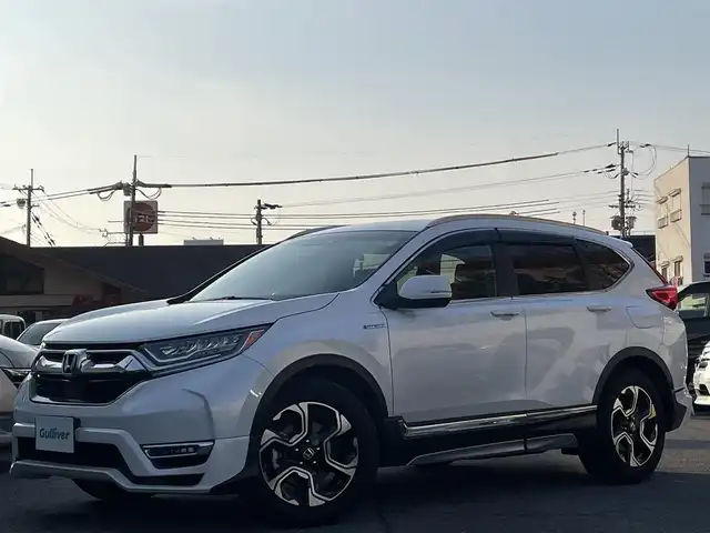 ホンダ ＣＲ－Ｖ ハイブリッド EX・マスターピース 兵庫県 2019(令1)年 5.1万km プラチナホワイトパール 純正インターナビ/フルセグTV/バックカメラ/BlueTooth/サンルーフ/パワーバックドア/レザーシート/パワーシート/シートヒーター/パドルシフト/ルーフレール/ビルドインETC2.0/ホンダセンシング/　・衝突軽減ブレーキ（CMBS）/　・誤発進抑制機能/　・歩行者事故低減ステアリング/　・路外逸脱抑制機能/　・先行車発進お知らせ機能/　・標識認識機能/　・オートハイビーム/　・アダプティブクルコン/　・車線維持支援システム（LKAS）