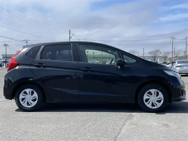 ホンダ フィット 13G F 道央・札幌 2019(令1)年 3.4万km クリスタルブラックパール ワンオーナー/純正ディーラーOPナビ/CD/DVD/BT/フルセグ/横滑り防止装置/バックカメラ/ビルトインETC/アイドリングストップ/ECONモード/プッシュスタート/スマートキー/ハロゲンヘッドライト/ヘッドライトレベライザー/電動格納ミラー/ウィンカーミラー/純正フロアマット/純正エンジンスターター/社外AW付夏タイヤ積込/175/70/R14/2023年/山3mm