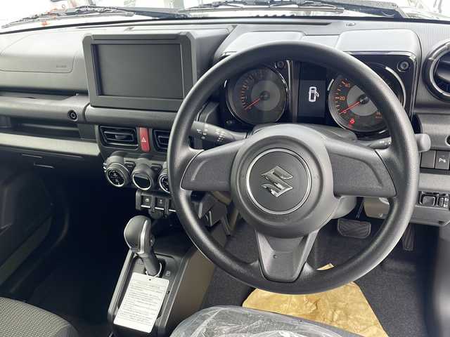 スズキ ジムニー XL 愛知県 2025(令7)年 0.1万km未満 ジャングルグリーン 届出済未使用車/４WD/レーダーブレーキサポート/レーンアシスト/横滑り防止/後方コーナーセンサー/フォグランプ/ダウンヒルアシスト/オートエアコン/オートライト/プッシュスタート/シートヒーター/電動格納ミラー/マニュアルヘッドライトレベリング