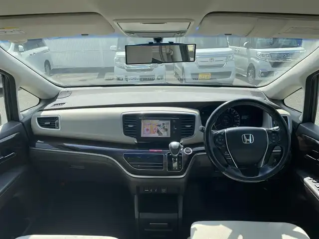 ホンダ オデッセイ G 山形県 2014(平26)年 7.9万km ホワイトオーキッドパール (株)IDOMが運営する【じしゃロン山形店】の自社ローン専用車両になります。/こちらは現金またはオートローンご利用時の価格です。/自社ローンご希望の方は別途その旨お申付け下さい。/純正ナビ/（FM/AM/ラジオ/CD/DVD/TV/Bluetooth）/フリップダウンモニター/両側パワースライドドア/クルーズコントロール/バックカメラ/ビルトインETC/オットマン/ステアリングスイッチ/プッシュスタート/ウィンカーミラー/アイドリングストップ/横滑り防止