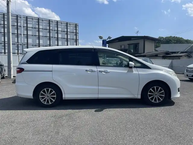 ホンダ オデッセイ G 山形県 2014(平26)年 7.9万km ホワイトオーキッドパール (株)IDOMが運営する【じしゃロン山形店】の自社ローン専用車両になります。/こちらは現金またはオートローンご利用時の価格です。/自社ローンご希望の方は別途その旨お申付け下さい。/純正ナビ/（FM/AM/ラジオ/CD/DVD/TV/Bluetooth）/フリップダウンモニター/両側パワースライドドア/クルーズコントロール/バックカメラ/ビルトインETC/オットマン/ステアリングスイッチ/プッシュスタート/ウィンカーミラー/アイドリングストップ/横滑り防止