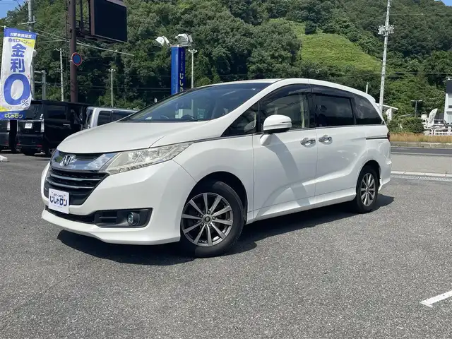 ホンダ オデッセイ G 山形県 2014(平26)年 7.9万km ホワイトオーキッドパール (株)IDOMが運営する【じしゃロン山形店】の自社ローン専用車両になります。/こちらは現金またはオートローンご利用時の価格です。/自社ローンご希望の方は別途その旨お申付け下さい。/純正ナビ/（FM/AM/ラジオ/CD/DVD/TV/Bluetooth）/フリップダウンモニター/両側パワースライドドア/クルーズコントロール/バックカメラ/ビルトインETC/オットマン/ステアリングスイッチ/プッシュスタート/ウィンカーミラー/アイドリングストップ/横滑り防止