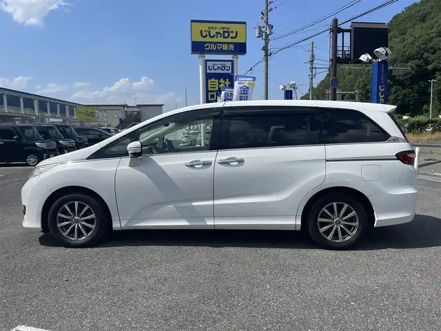 ホンダ オデッセイ G 山形県 2014(平26)年 7.9万km ホワイトオーキッドパール (株)IDOMが運営する【じしゃロン山形店】の自社ローン専用車両になります。/こちらは現金またはオートローンご利用時の価格です。/自社ローンご希望の方は別途その旨お申付け下さい。/純正ナビ/（FM/AM/ラジオ/CD/DVD/TV/Bluetooth）/フリップダウンモニター/両側パワースライドドア/クルーズコントロール/バックカメラ/ビルトインETC/オットマン/ステアリングスイッチ/プッシュスタート/ウィンカーミラー/アイドリングストップ/横滑り防止