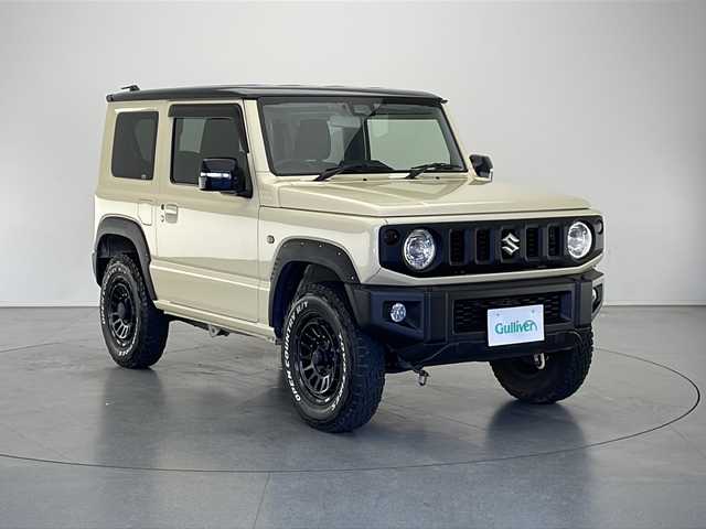 スズキ ジムニー XC 長野県 2022(令4)年 1.7万km シフォンアイボリーメタリックブラック2トーンルーフ 4WD/社外メモリナビ&フルセグTV&CD&DVD&BT/クルーズコントロール/車線逸脱警報/衝突軽減ブレーキ/アイドリングストップ/前席シートヒーター/ステアリングスイッチ/LEDヘッドライト/オートライト/フロントフォグランプ/ヘッドライトウォッシャー/電動格納ミラー/ドアミラーヒーター/社外16インチAW装着/社外フェンダーモール/社外フロアマット/純正ドアバイザー/背面タイヤ/プッシュスタート/スマートキー