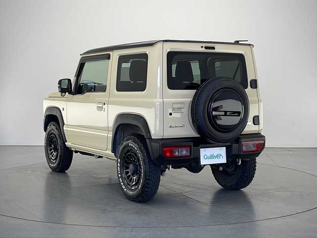 スズキ ジムニー XC 長野県 2022(令4)年 1.7万km シフォンアイボリーメタリックブラック2トーンルーフ 4WD/社外メモリナビ&フルセグTV&CD&DVD&BT/クルーズコントロール/車線逸脱警報/衝突軽減ブレーキ/アイドリングストップ/前席シートヒーター/ステアリングスイッチ/LEDヘッドライト/オートライト/フロントフォグランプ/ヘッドライトウォッシャー/電動格納ミラー/ドアミラーヒーター/社外16インチAW装着/社外フェンダーモール/社外フロアマット/純正ドアバイザー/背面タイヤ/プッシュスタート/スマートキー