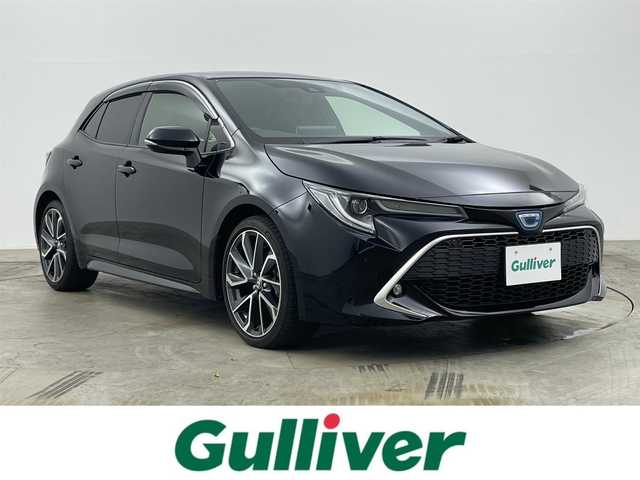 トヨタ カローラ スポーツ ハイブリッドG Z 岡山県 2022(令4)年 1.7万km アティチュードブラックマイカ 衝突軽減ブレーキ　/レーダークルーズコントロール　/ビルトインＥＴＣ２．０　/シートヒーター　/ＬＥＤヘッドライト　/バックカメラ　/ブラインドスポットモニター　/コーナーセンサー　/オートハイビーム　/プッシュスタート/ＵＳＢ接続/踏み間違い防止/ステアリングヒーター/オートブレーキホールド/ISOFIX/ステアリングスイッチ/チルトステアリング/シートリフター/ウィンカーミラー/ドアバイザー