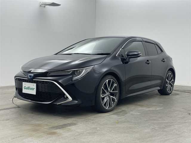 トヨタ カローラ スポーツ ハイブリッドG Z 岡山県 2022(令4)年 1.7万km アティチュードブラックマイカ 衝突軽減ブレーキ　/レーダークルーズコントロール　/ビルトインＥＴＣ２．０　/シートヒーター　/ＬＥＤヘッドライト　/バックカメラ　/ブラインドスポットモニター　/コーナーセンサー　/オートハイビーム　/プッシュスタート/ＵＳＢ接続/踏み間違い防止/ステアリングヒーター/オートブレーキホールド/ISOFIX/ステアリングスイッチ/チルトステアリング/シートリフター/ウィンカーミラー/ドアバイザー