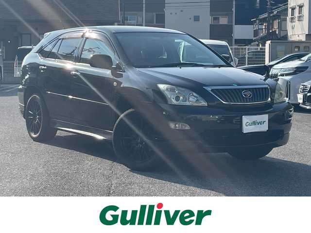 トヨタ ハリアー 240G プレミアム Lパッケージ 兵庫県 2008(平20)年 11万km ブラック 社外メモリーナビ/Bluetooth/バックカメラ/フルセグ/DVD再生可能/ETC2.0/パワーシート/リモコンキー/社外アルミホイール/スタットレスタイヤ（積込）/純正アルミホイール（積込）/シートカバー/フロアマット/ドアバイザー/電動格納ミラー/保証書/取扱説明書