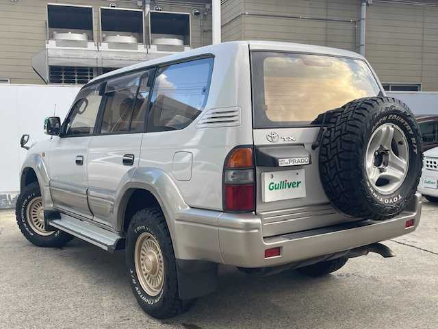 トヨタ ランドクルーザー プラド TX 青森県 2001(平13)年 1.6万km クリスタルシルバーパールM/ライトグレイッシュベージュM 社外１６ＡＷ夏/１６ＡＷ冬/背面タイヤ/ウッドハンドル/取扱説明