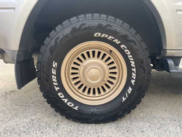 トヨタ ランドクルーザー プラド TX 青森県 2001(平13)年 1.6万km クリスタルシルバーパールM/ライトグレイッシュベージュM 社外１６ＡＷ夏/１６ＡＷ冬/背面タイヤ/ウッドハンドル/取扱説明