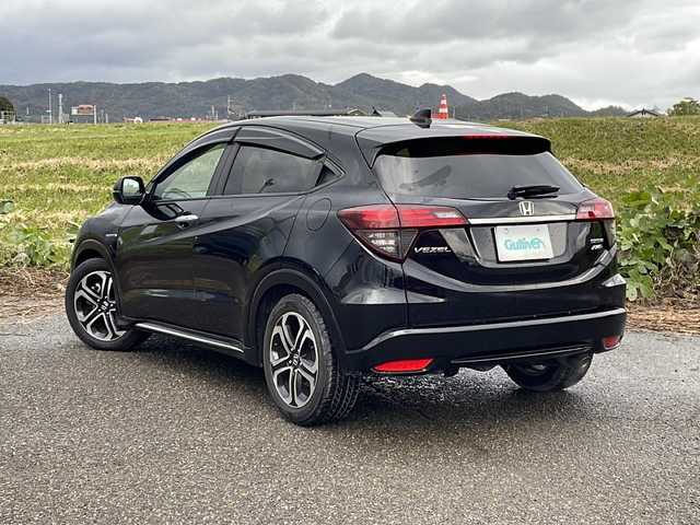 ホンダ ヴェゼル ハイブリッド Z ホンダセンシング 新潟県 2019(平31)年 6.3万km クリスタルブラックパール 4WD/社外SDナビ(AVIC-RZ902)/CD/DVD/BT/フルセグテレビ/ETC/ドライブレコーダー/衝突被害軽減ブレーキ/レーンキープアシスト/レーダークルーズコントロール/半革シート/シートヒーター /ステアリングスイッチ/パドルシフト/スマートキー/プッシュスタート/LEDヘッドライト/オートライト/フォグランプ/純正17インチアルミホイール