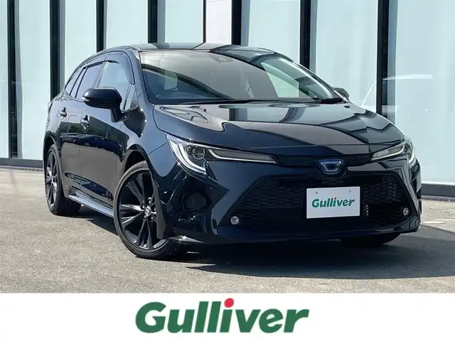トヨタ カローラツーリング ハイブリッド ダブルバイビー 大阪府 2022(令4)年 0.7万km ブラックマイカ 純正ナビ /バックカメラ /フルセグTV/ETC/BT/USB /前席シートヒーター /ハーフレザー /追従走行有りクルーズコントロール /LED /純正17インチアルミホイール /BSM/衝突軽減システム /オートマチックハイビーム /プッシュスタート