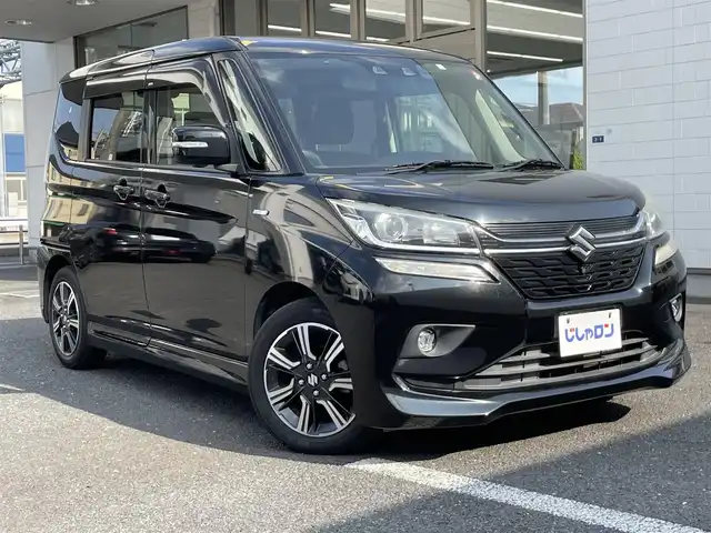 スズキ ソリオ バンディット HV MV 埼玉県 2018(平30)年 10.3万km スーパーブラックパール (株)IDOMが運営する【じしゃロン鳩ヶ谷店】の自社ローン専用車両になりますこちらは現金またはオートローンご利用時の価格です。自社ローンご希望の方は別途その旨お申付け下さい/登録時102740km/両側パワースライドドア/ストラーダSDナビ（CN-RZ746W）/　AM/FM/CD/DVD/MSV/BT/フルセグTV/全方位モニター/ETC/衝突被害軽減システム/レーンキープアシスト/オートクルーズコントロール/横滑り防止機能/プッシュスタート/スマートキー/パドルシフト/D席シートヒーター/LEDヘッドライト/純正15インチAW/電動格納機能付きウインカーミラー/ドアバイザー/純正フロアマット