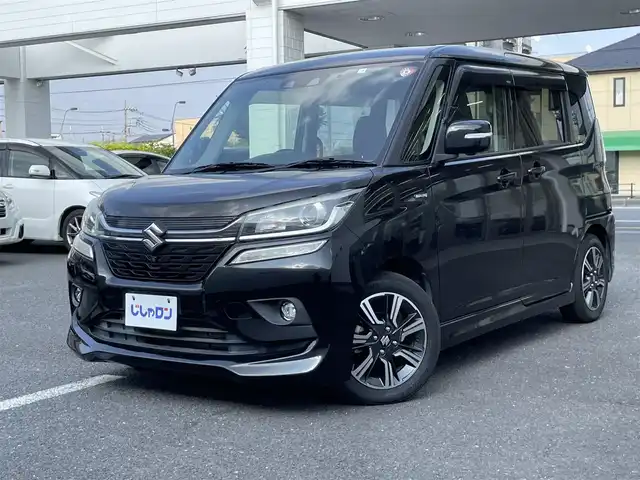 スズキ ソリオ バンディット HV MV 埼玉県 2018(平30)年 10.3万km スーパーブラックパール (株)IDOMが運営する【じしゃロン鳩ヶ谷店】の自社ローン専用車両になりますこちらは現金またはオートローンご利用時の価格です。自社ローンご希望の方は別途その旨お申付け下さい/登録時102740km/両側パワースライドドア/ストラーダSDナビ（CN-RZ746W）/　AM/FM/CD/DVD/MSV/BT/フルセグTV/全方位モニター/ETC/衝突被害軽減システム/レーンキープアシスト/オートクルーズコントロール/横滑り防止機能/プッシュスタート/スマートキー/パドルシフト/D席シートヒーター/LEDヘッドライト/純正15インチAW/電動格納機能付きウインカーミラー/ドアバイザー/純正フロアマット