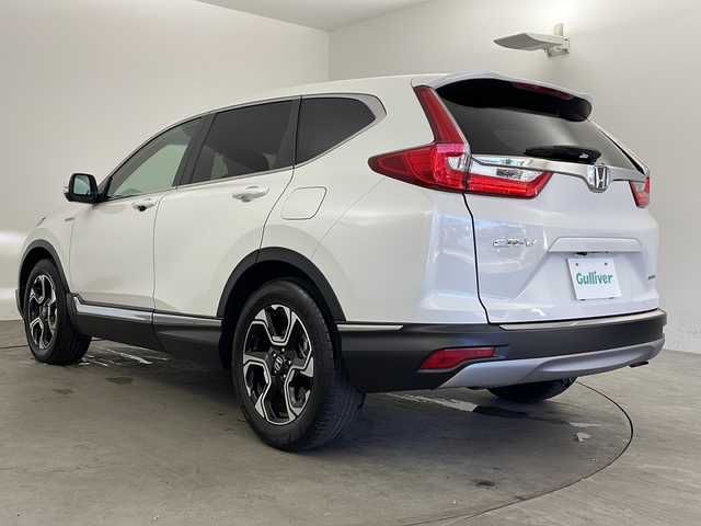 ホンダ ＣＲ－Ｖ ハイブリッド EX 兵庫県 2018(平30)年 3.5万km プラチナホワイトパール ・ホンダセンシング/・衝突軽減ブレーキ【CMBS]/・先行車発進お知らせ機能/・路外逸脱抑制システム/・レーンキープアシスト/・ブラインドスポットモニター/・標識認識機能/・ドライバー注意力警告/・レーダークルーズコントロール/・純正ナビ＆フルセグ＆BT＆DVD/・バックカメラ/・スマートキー/・ビルトインETC2.0/・パドルシフト/・前席シートヒーター/・ドアミラーヒーター/・プラズマクラスター/・社外前後デジタルミラー型ドライブレコーダー/・フロントワイパーデザイアー/・LEDライト/・LEDフォグランプ/・純正18インチAW