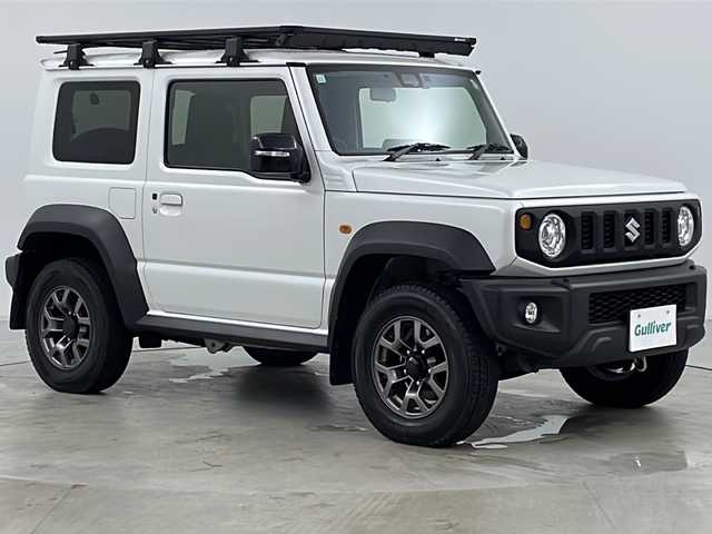 スズキ ジムニー シエラ JC 道央・札幌 2023(令5)年 1.9万km ピュアホワイトP ・4WD/・純正ナビ（TV＆CD＆DVD＆BT＆SD）/・バックカメラ/・スズキセーフティサポート/・アイドリングストップ/・クルーズコントロール/・ステアリングスイッチ/・へッドライトウォッシャー/・ルーフキャリア/・純正ドライブレコーダー（前後）/・ビルトインETC/・スマートキー/・オートライト/・LEDライト